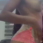 Showing Her Pointed Boobs